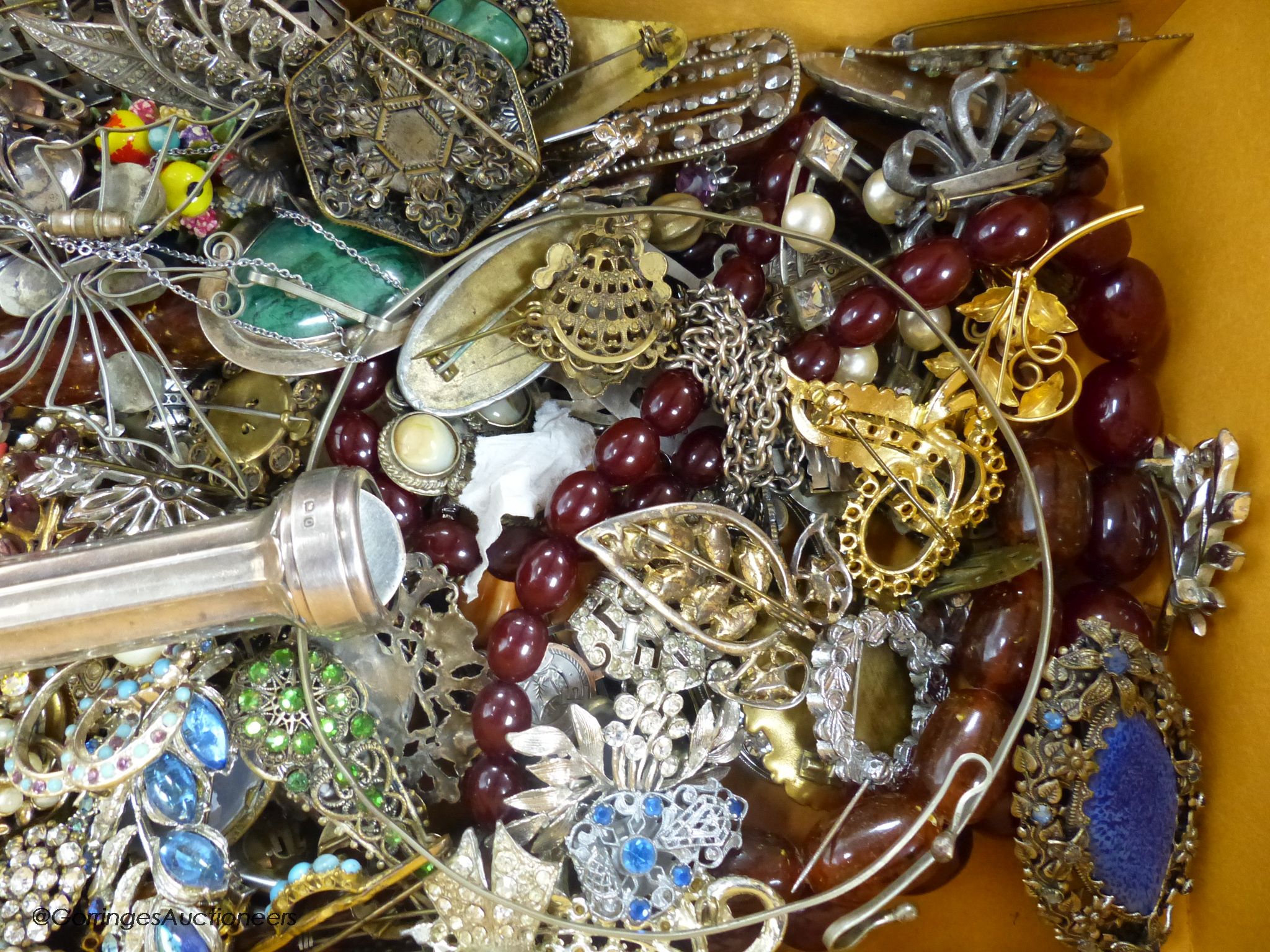 A quantity of mixed mainly costume jewellery etc and other items including a silver cased torch(a.f.) and two simulated amber necklaces.